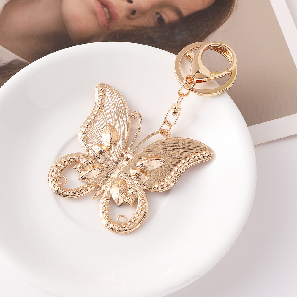 แฟชั่นพวงกุญแจรูปผีเสื้อสีชมพู - Luxury Bags Wholesale บทวิจารณ์และราคา